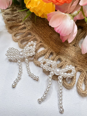 Enchanted Elegance Pearl Bow Earrings